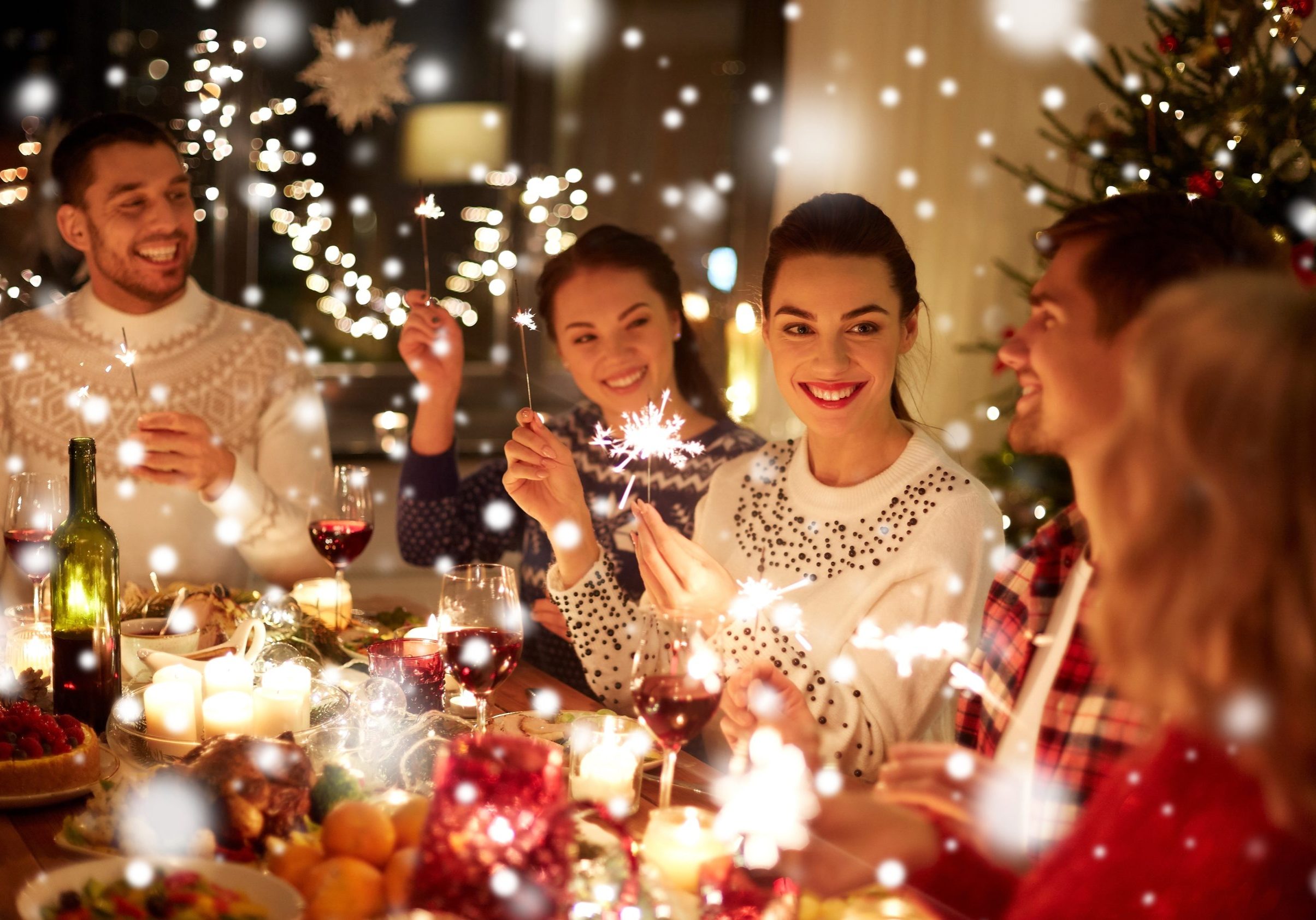 Winter,Holidays,And,People,Concept,-,Happy,Friends,With,Sparklers